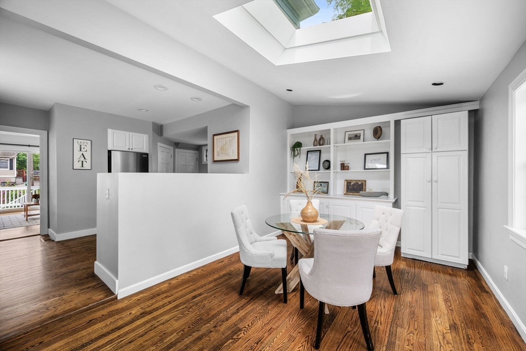 8 Baker Avenue Beverly, MA 01915 - Photo 4 of 40 a living room with furniture and wooden floor