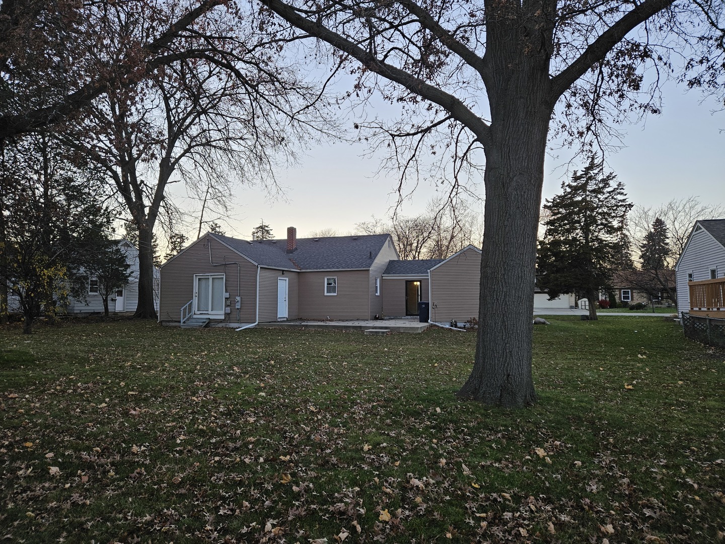 239 South McLean Boulevard Elgin, IL 60123 - Photo 26 of 30 a view of a house with a yard