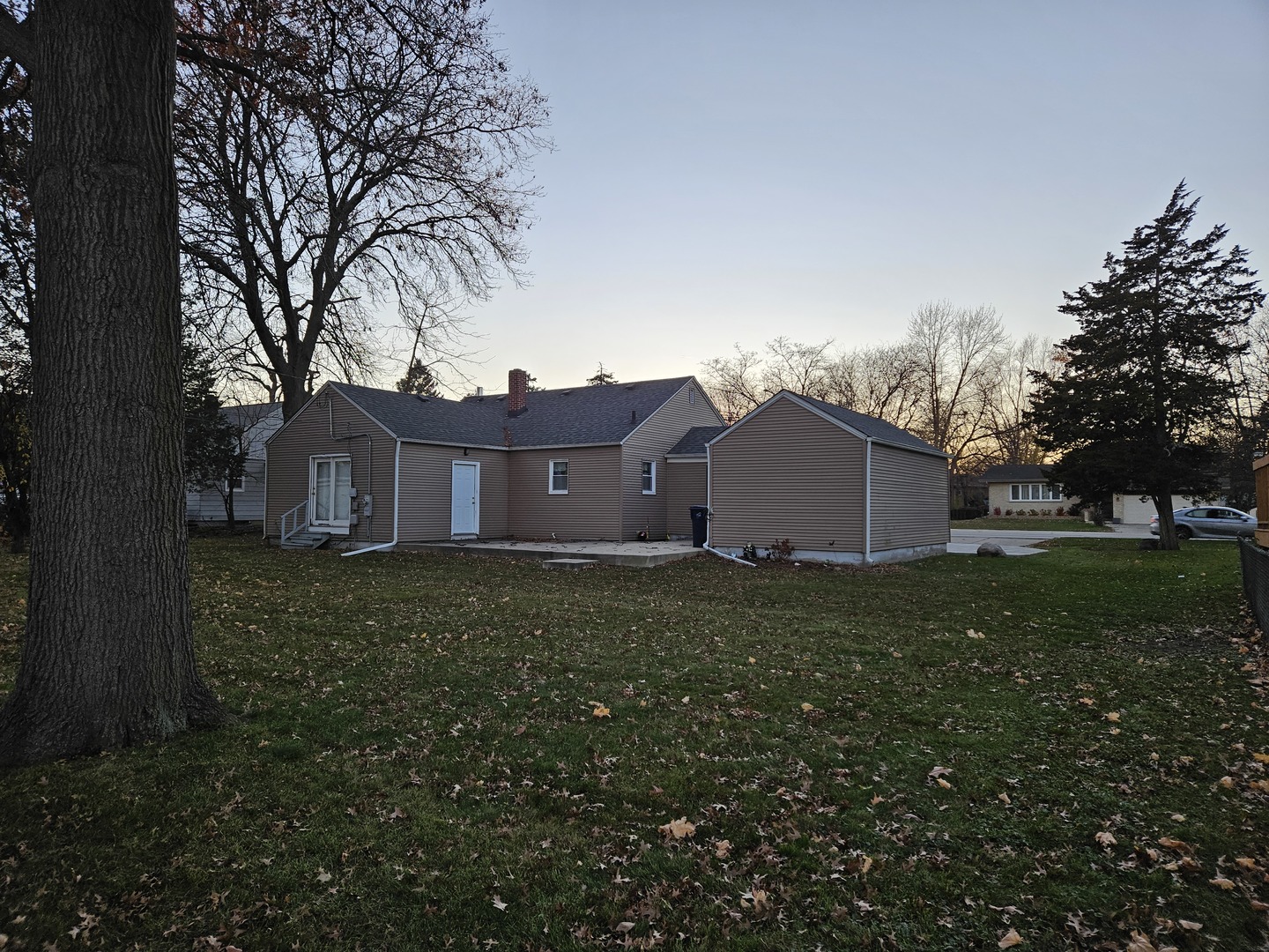 239 South McLean Boulevard Elgin, IL 60123 - Photo 27 of 30 a view of a house with a yard