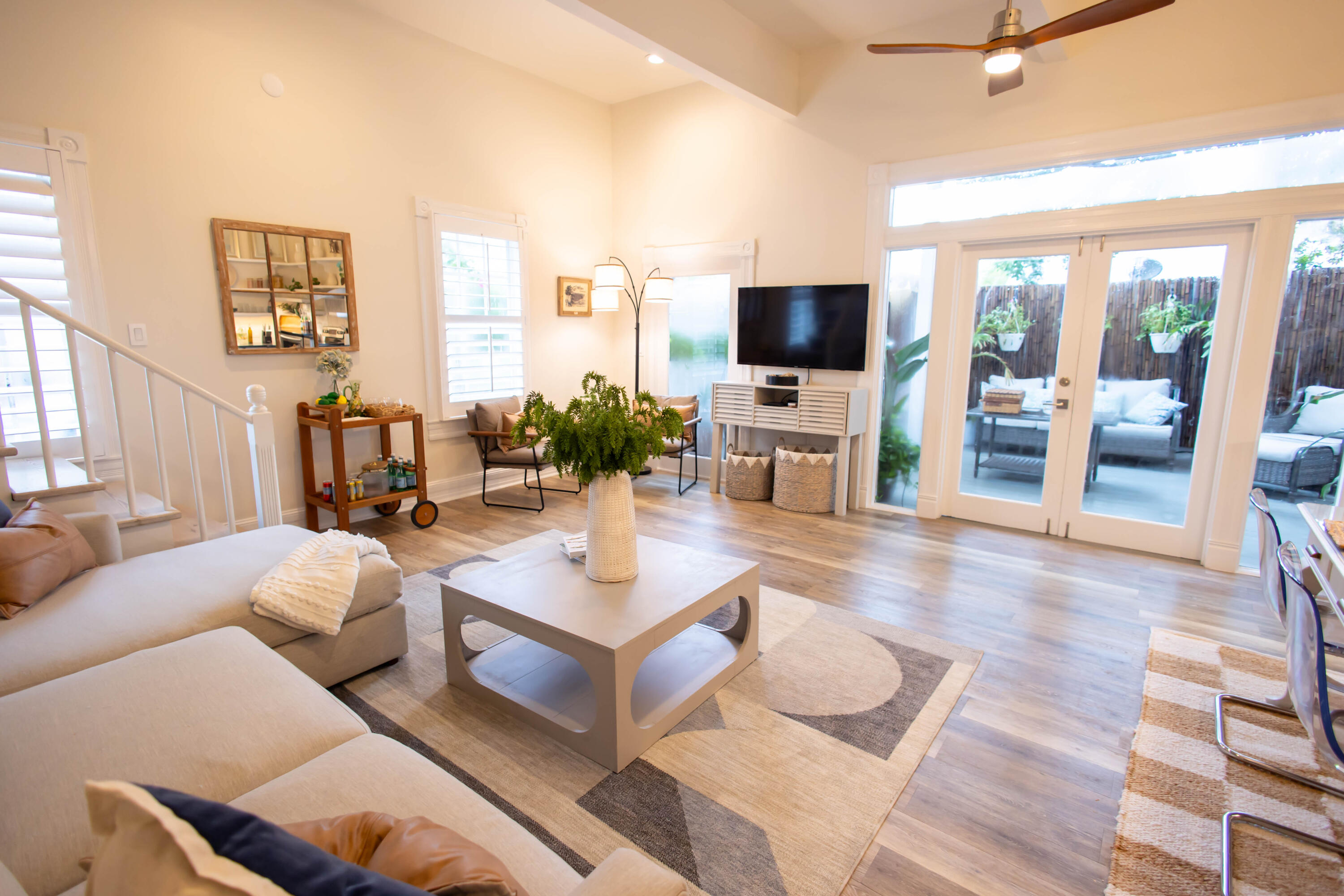 1012 Whitehead Street Key West, FL 33040 - Photo 1 of 49 a living room with furniture and a flat screen tv