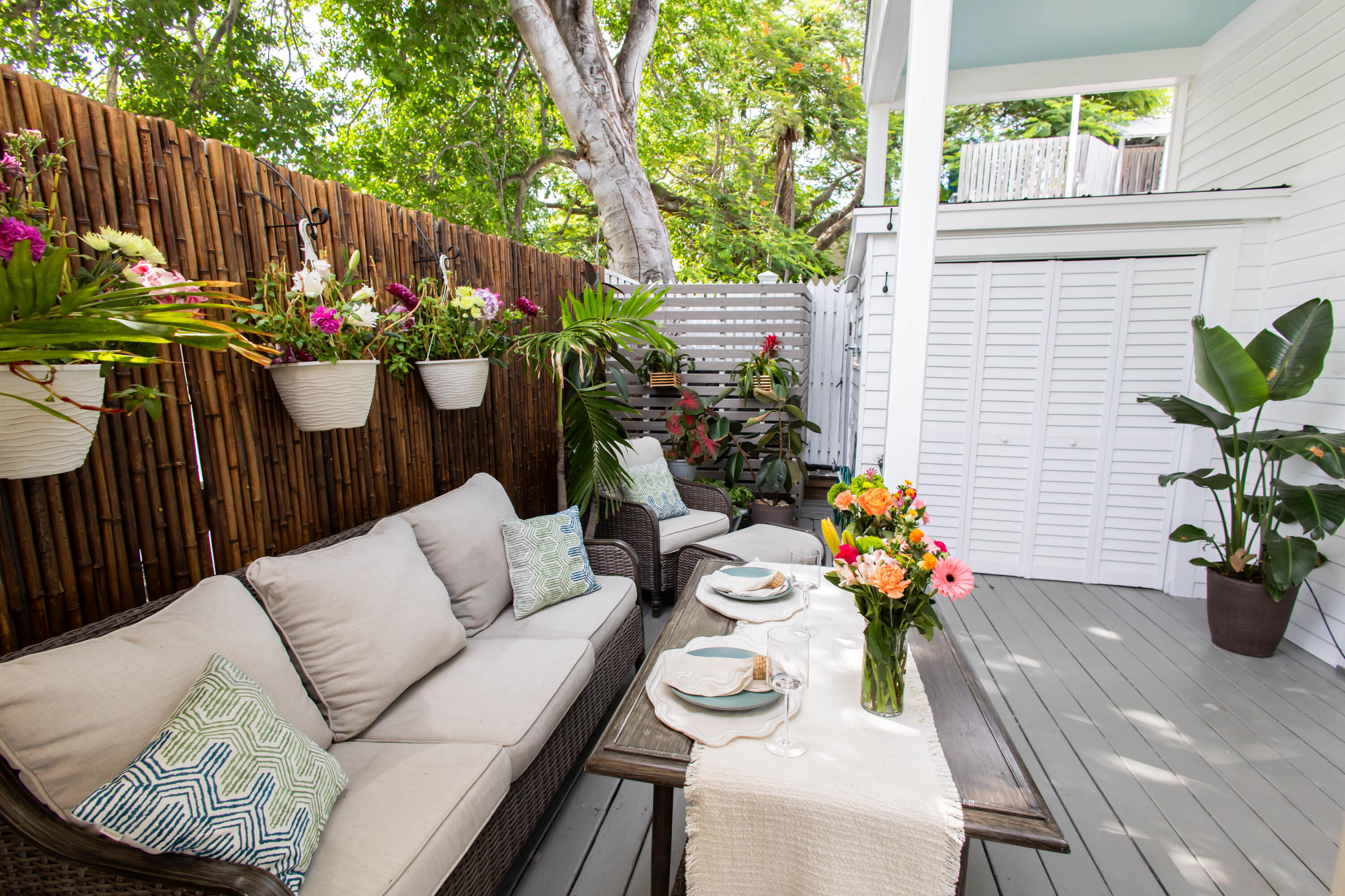 1012 Whitehead Street Key West, FL 33040 - Photo 3 of 49 a view of a chairs and table in a patio