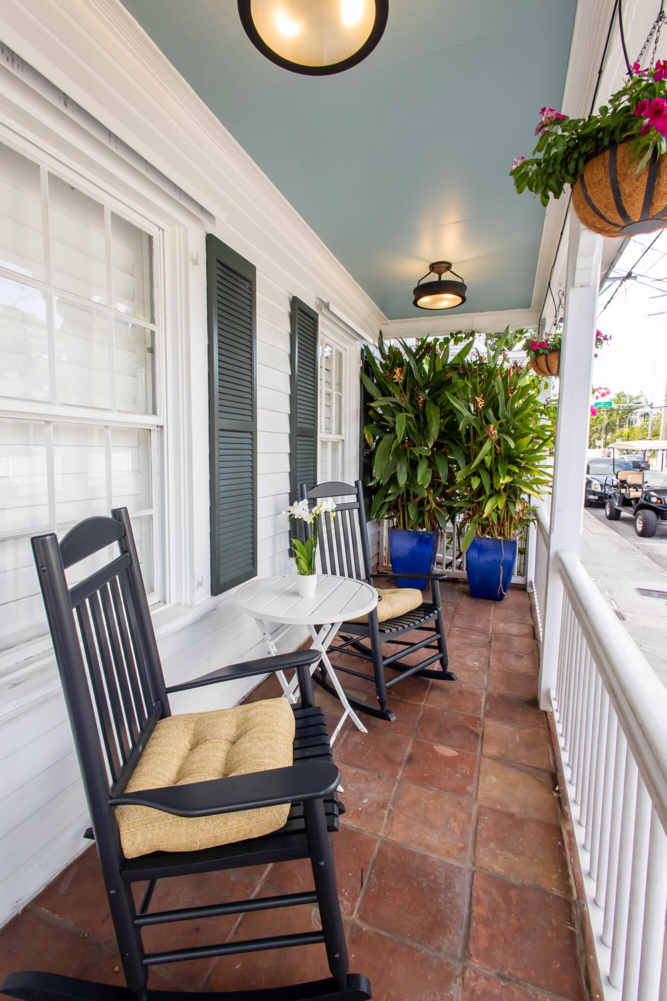 1012 Whitehead Street Key West, FL 33040 - Photo 46 of 49 a balcony with furniture and a potted plant