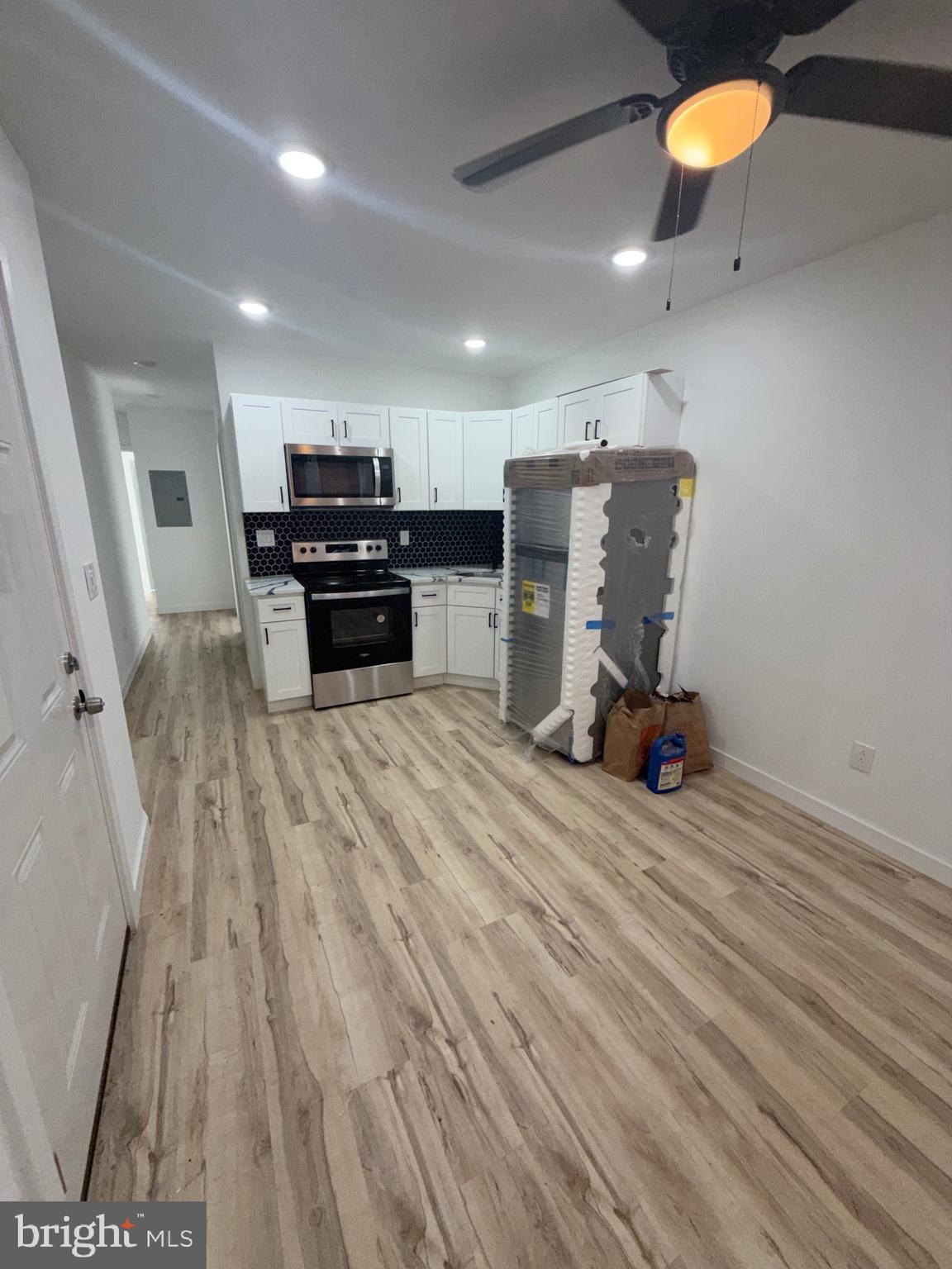 1924 68th Avenue Philadelphia, PA 19138 - Photo 3 of 12 a view of a room with furniture and a wooden floor