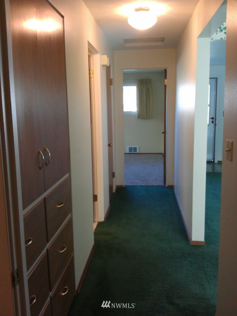 206 Heather Road, Unit 2 Everett, WA 98203 - Photo 6 of 12 a view of a bathroom from a hallway