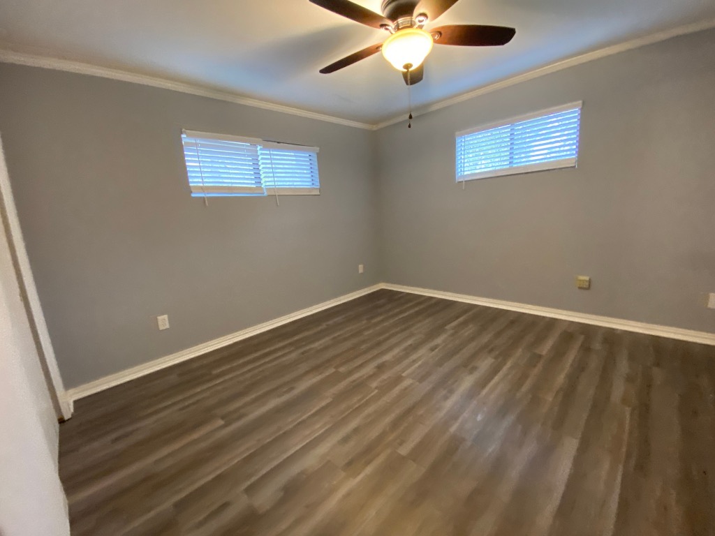 6211 Chesterfield Avenue, Unit B Austin, TX 78752 - Photo 11 of 24 an empty room with a window