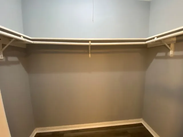 a view of a room with racks on the wall