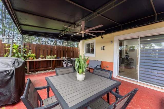 a view of an outdoor space with furniture