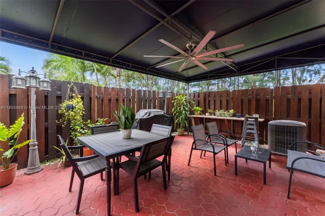 a view of a park with palm trees
