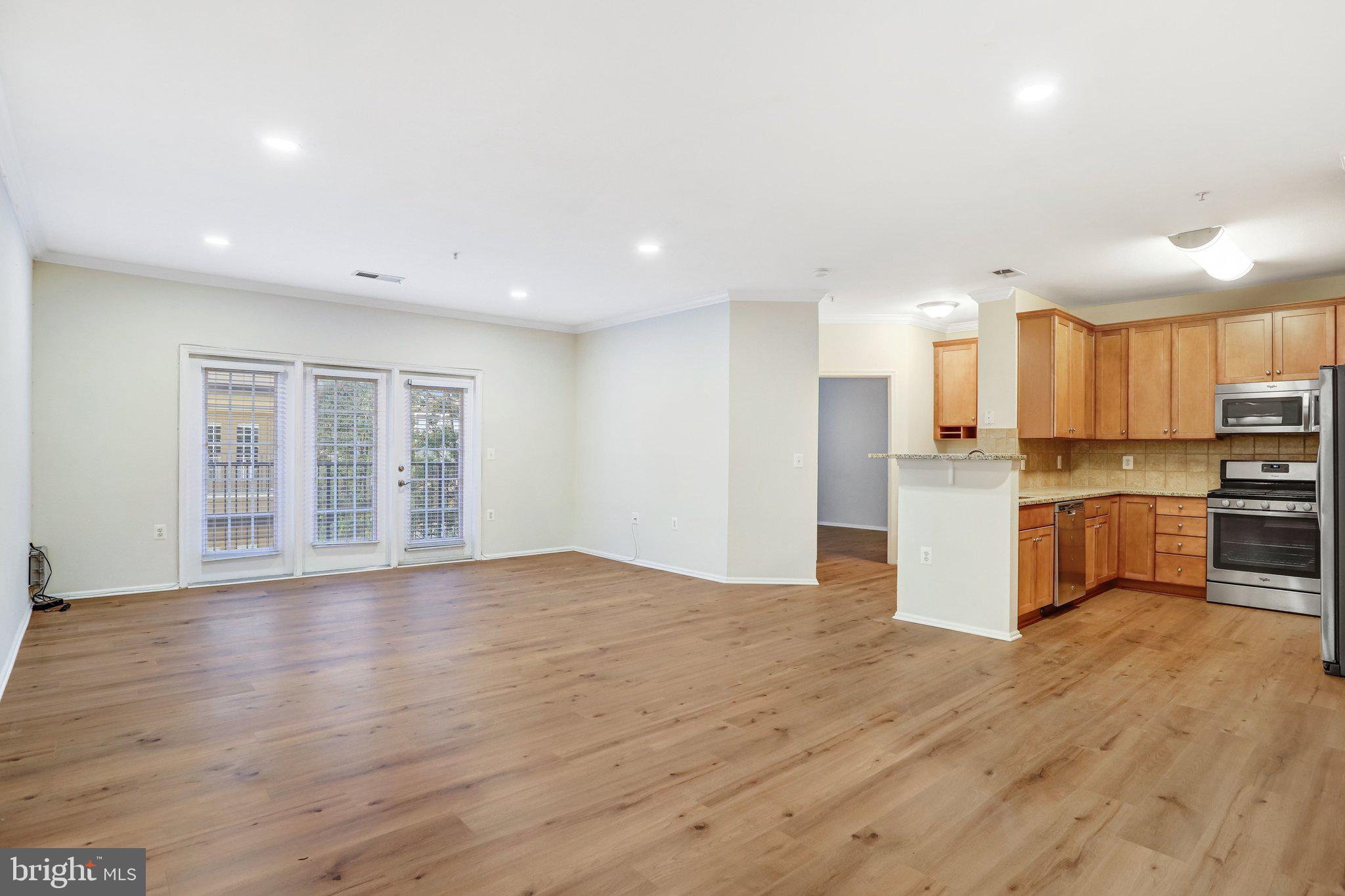 11800 Old Georgetown Road, Unit 1207 North Bethesda, MD 20852 - Photo 13 of 65 a view of kitchen with wooden floor