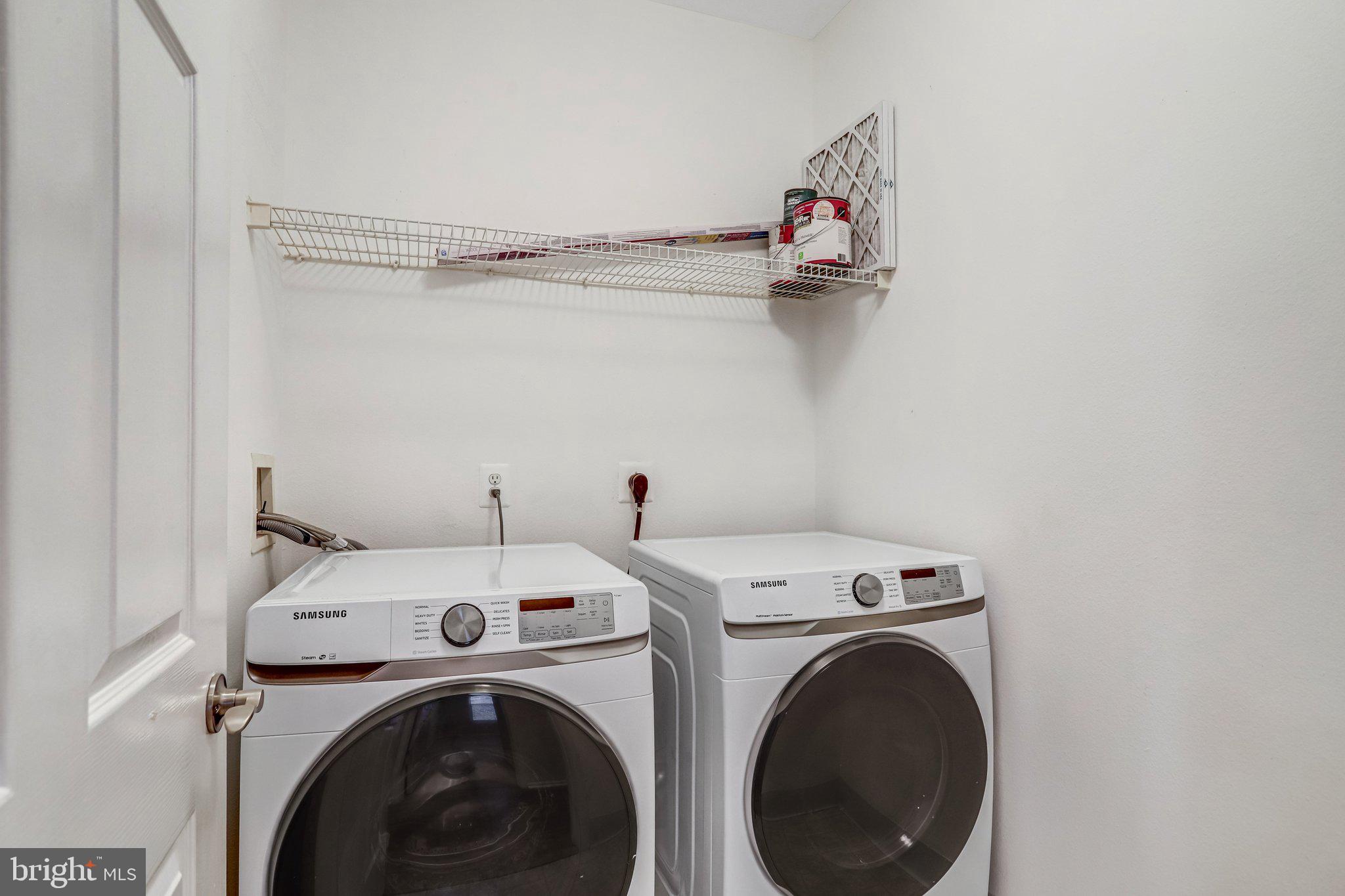 11800 Old Georgetown Road, Unit 1207 North Bethesda, MD 20852 - Photo 38 of 65 a utility room with dryer and washer