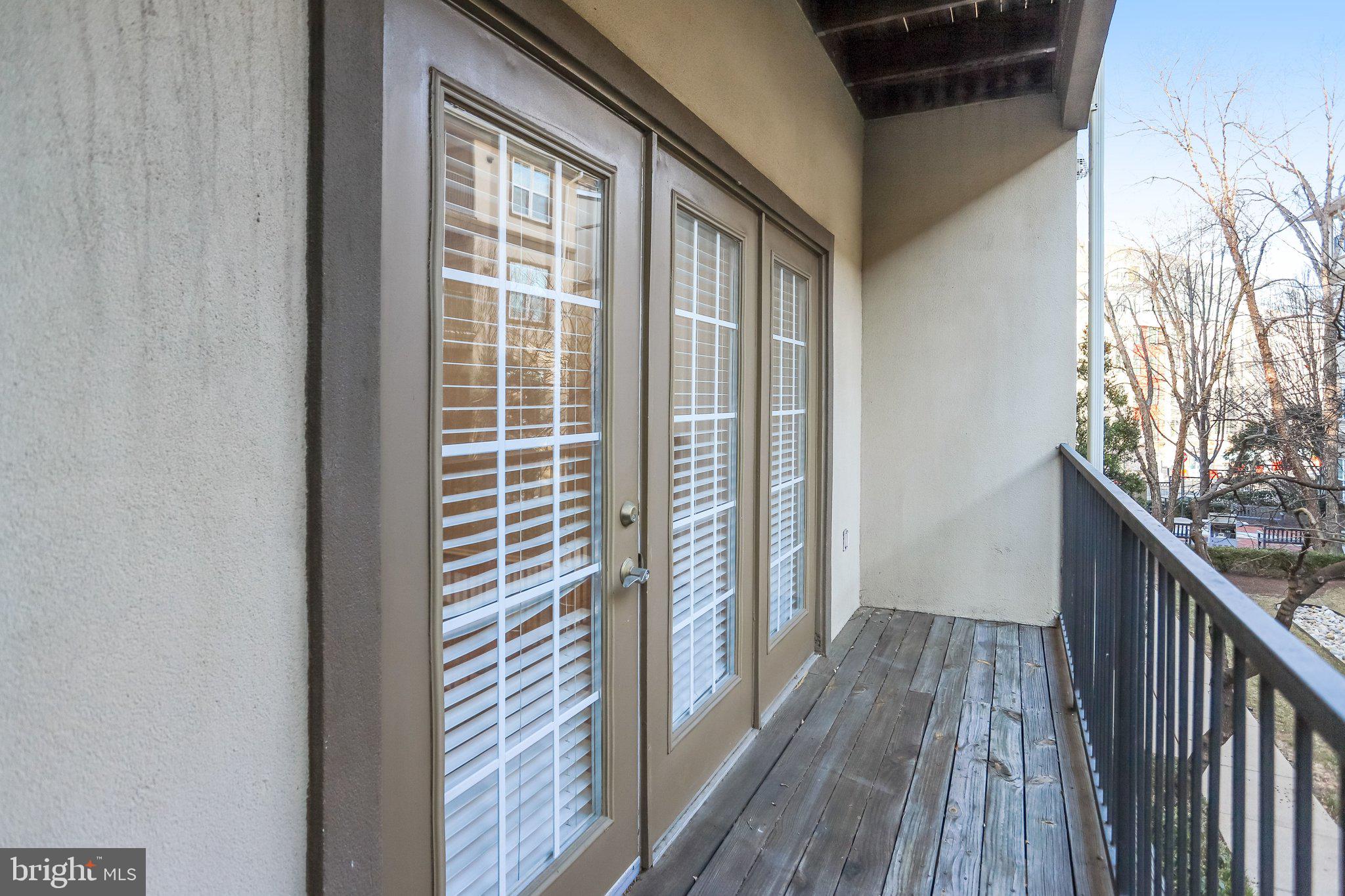 11800 Old Georgetown Road, Unit 1207 North Bethesda, MD 20852 - Photo 40 of 65 a view of balcony and wooden floor