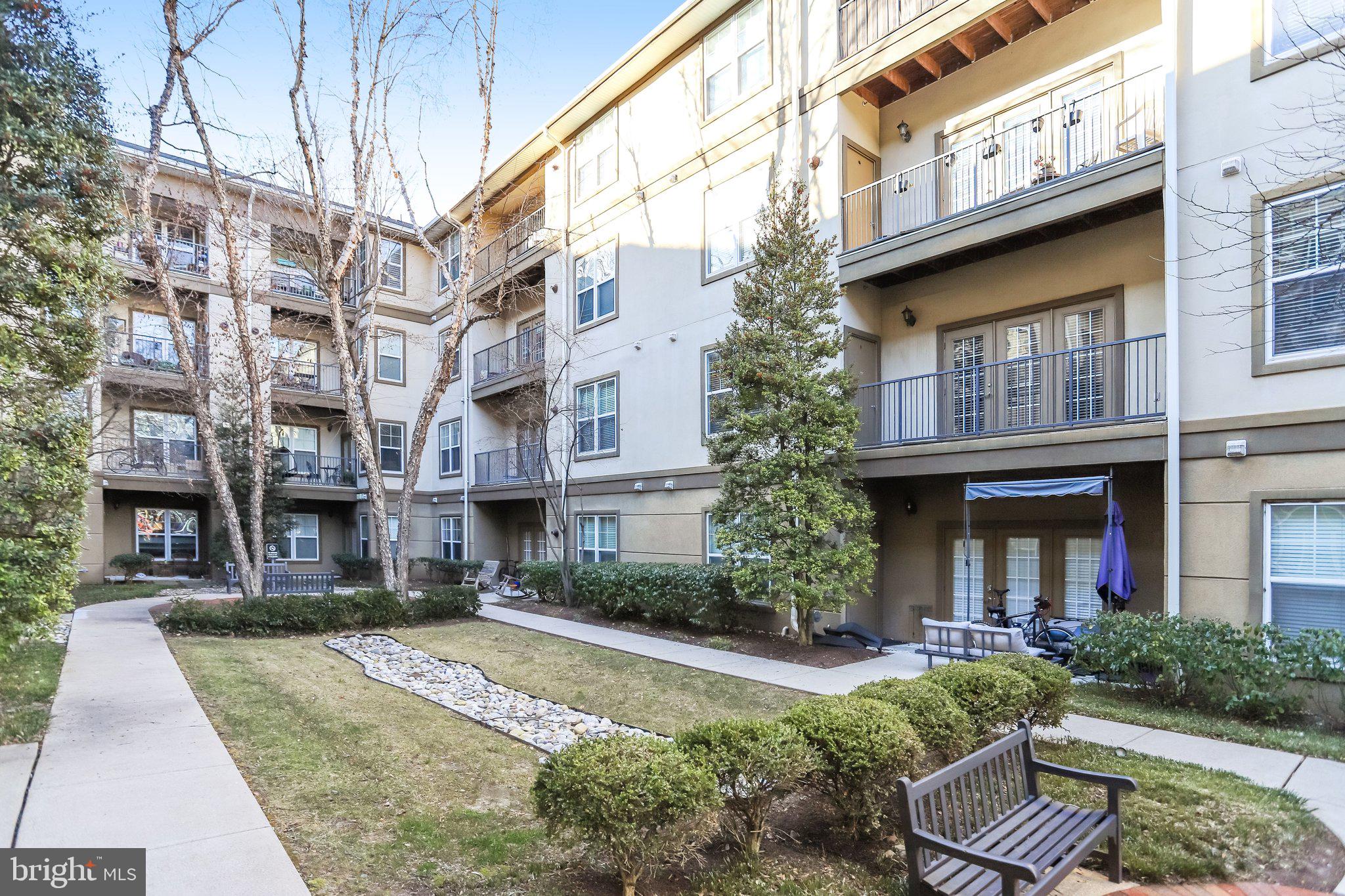 11800 Old Georgetown Road, Unit 1207 North Bethesda, MD 20852 - Photo 45 of 65 Ground level court yard looking up to balcony