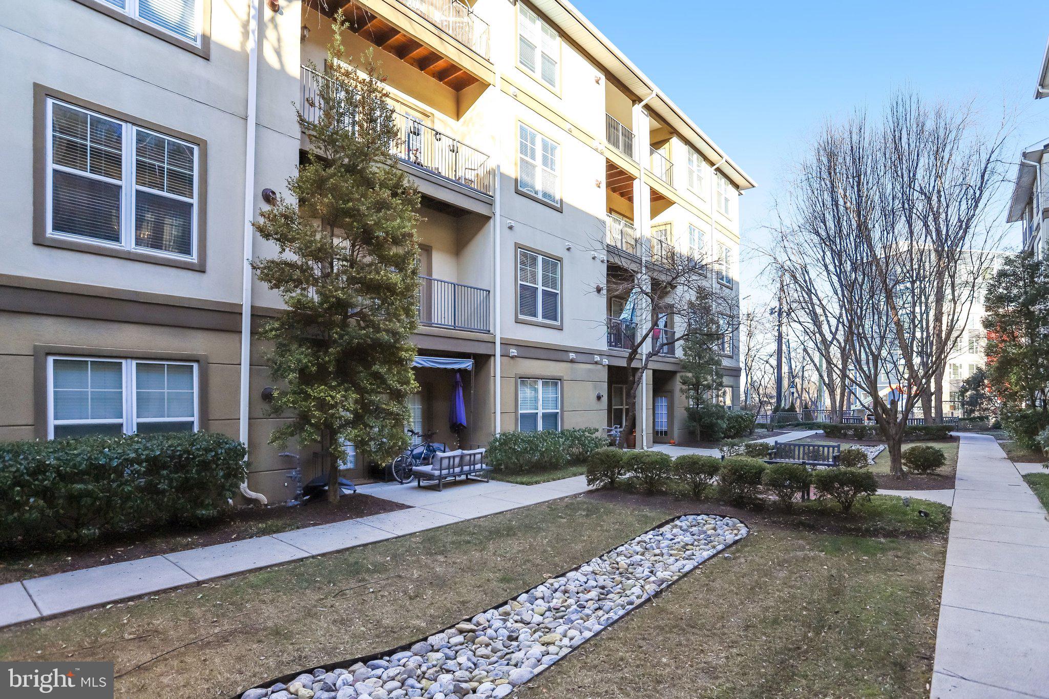 11800 Old Georgetown Road, Unit 1207 North Bethesda, MD 20852 - Photo 46 of 65 a view of a building with a yard