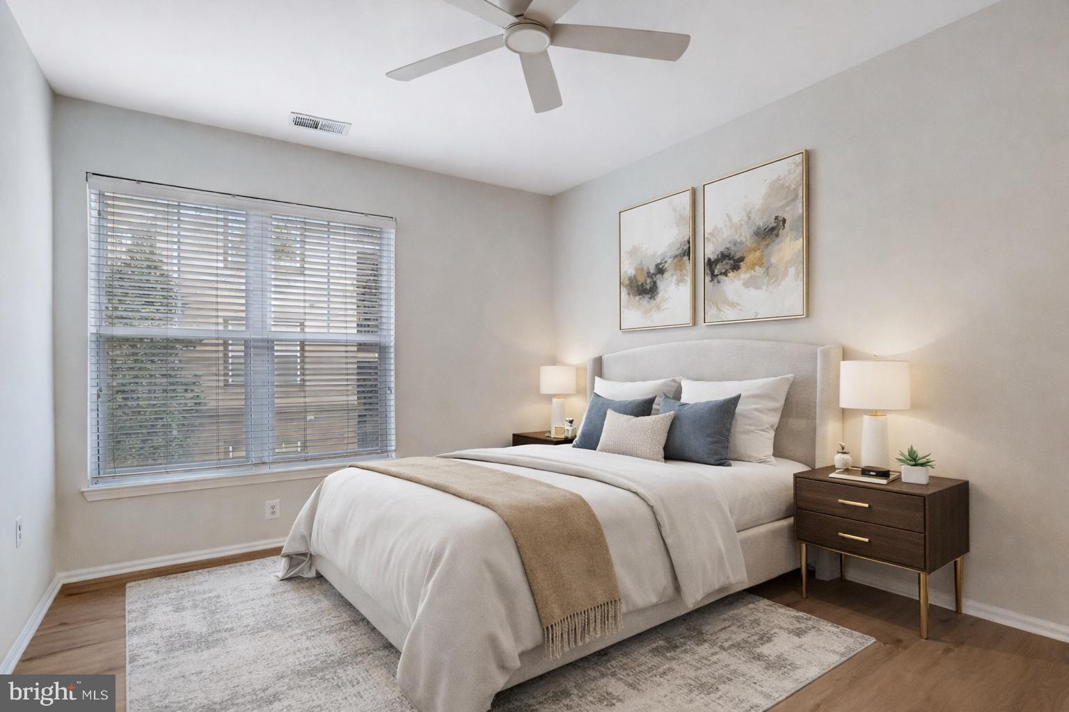 11800 Old Georgetown Road, Unit 1207 North Bethesda, MD 20852 - Photo 6 of 65 a bedroom with a bed and a window