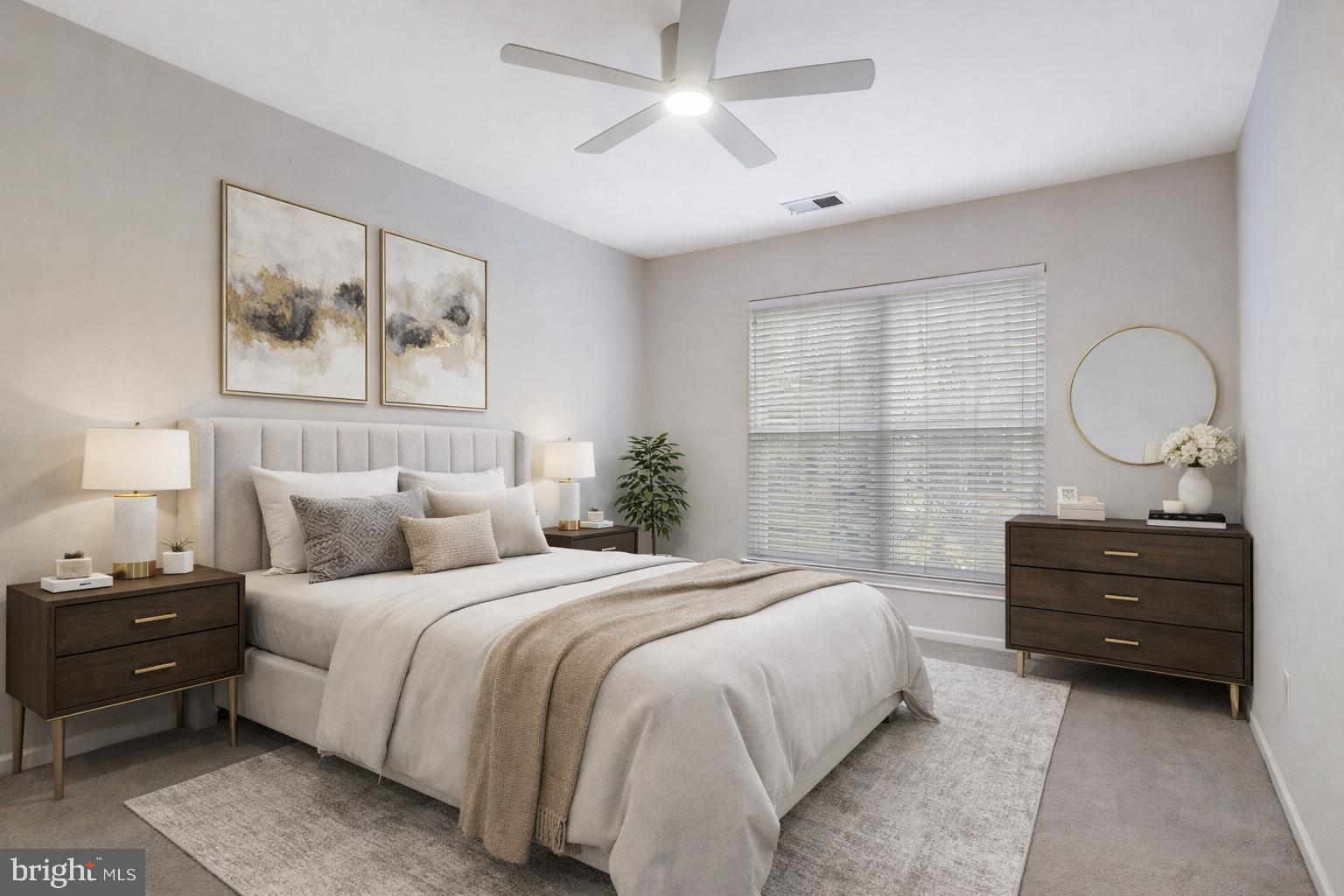 11800 Old Georgetown Road, Unit 1207 North Bethesda, MD 20852 - Photo 10 of 65 a bedroom with a bed and a painting on the wall