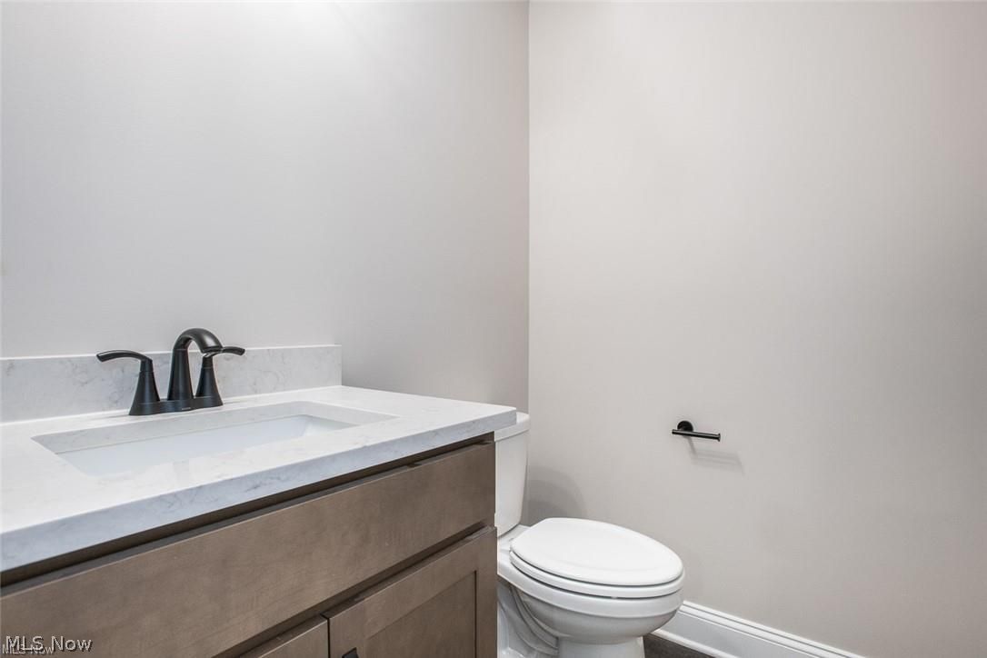 34286 Brookside Lane North Ridgeville, OH 44039 - Photo 48 of 50 Half bathroom featuring vanity and toilet
