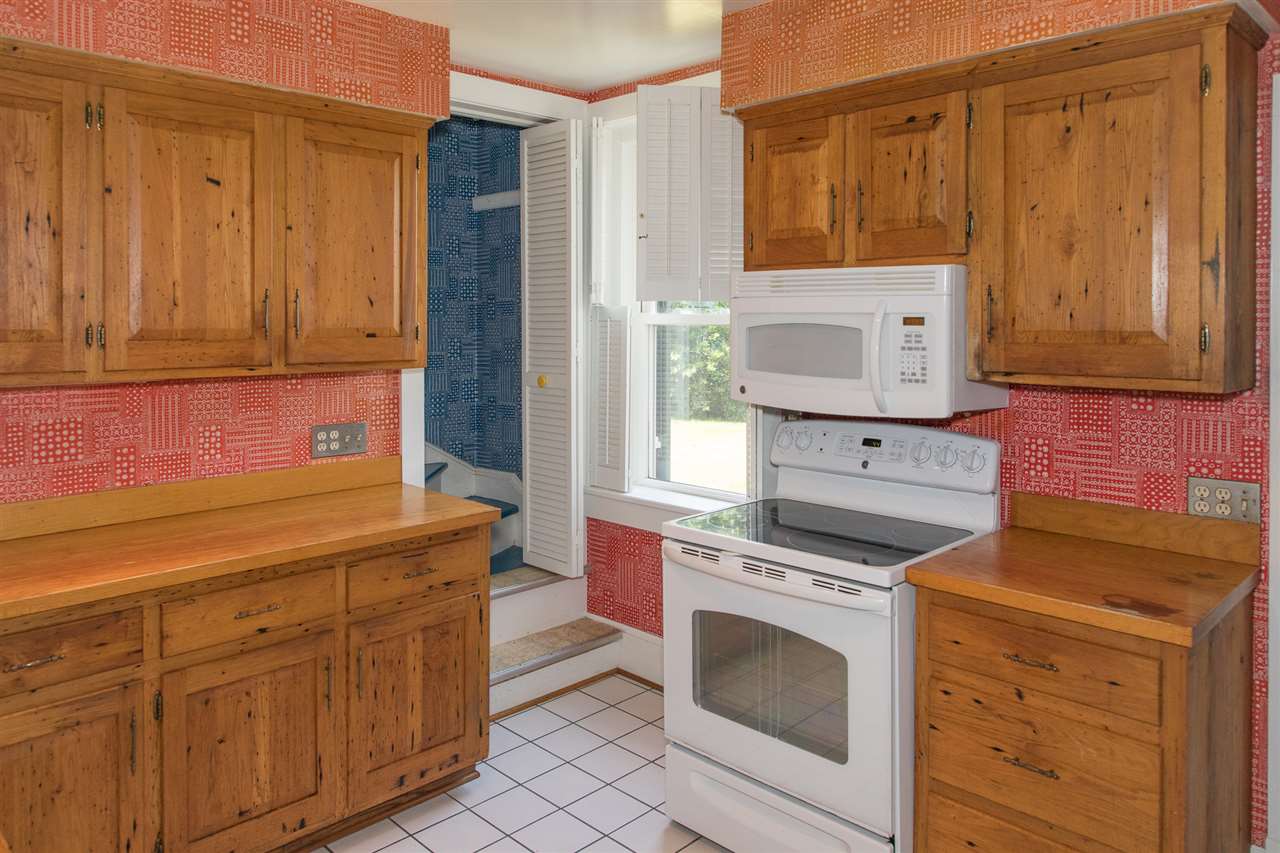 395 Kindig Road Waynesboro, VA 22980 - Photo 12 of 45 a kitchen with cabinets appliances and wooden cabinets
