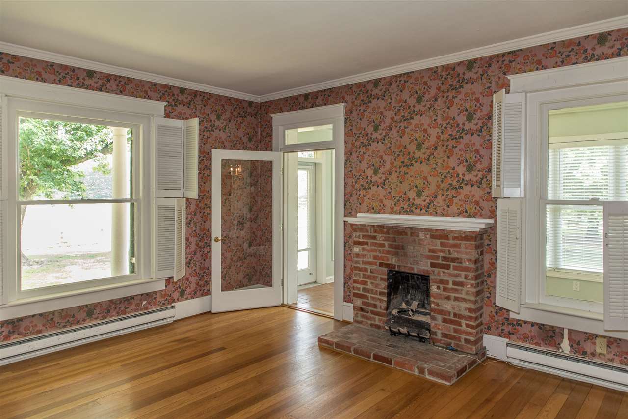 395 Kindig Road Waynesboro, VA 22980 - Photo 20 of 45 wooden floor fireplace and windows in an empty room