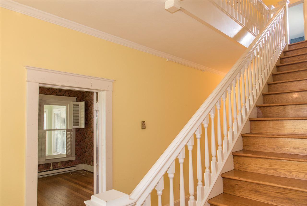 395 Kindig Road Waynesboro, VA 22980 - Photo 28 of 45 a view of a hallway with wooden floor and staircase