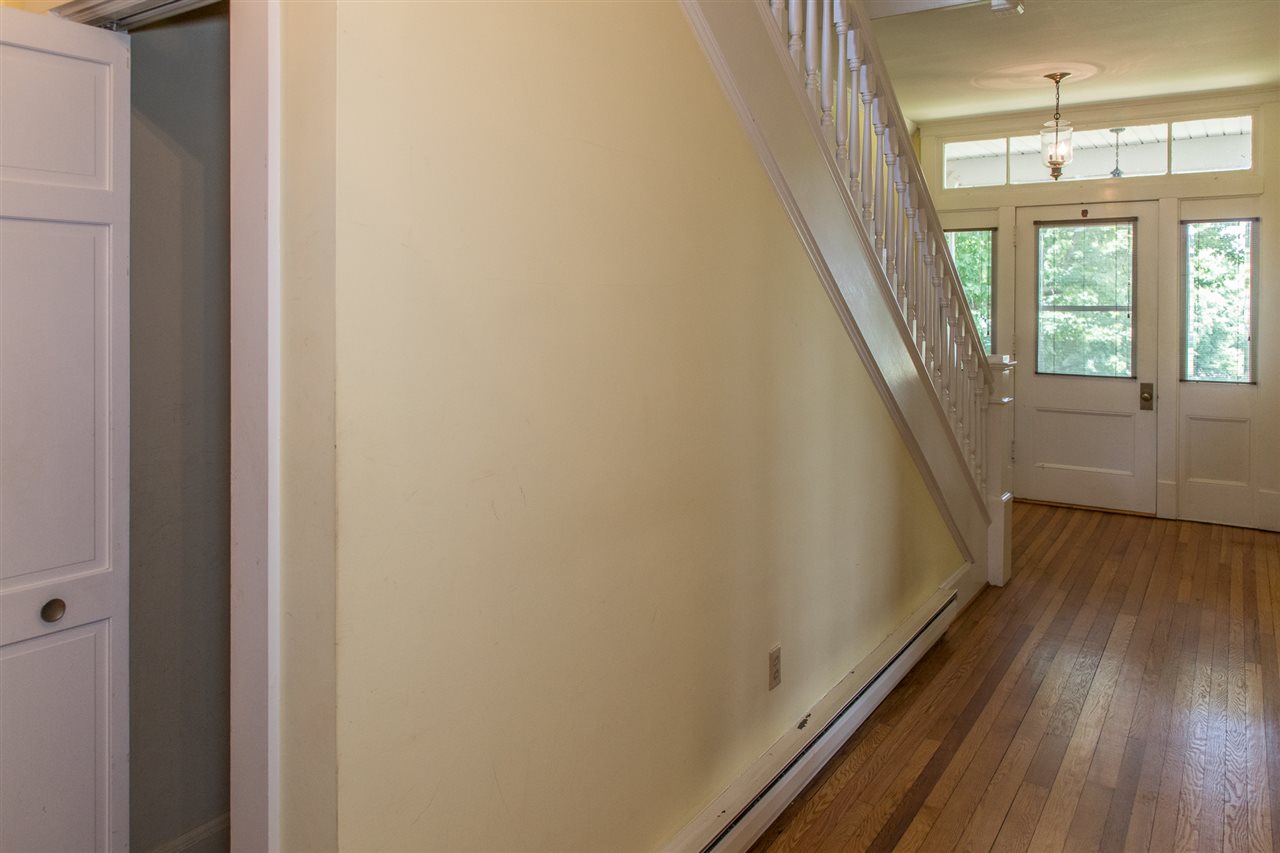 395 Kindig Road Waynesboro, VA 22980 - Photo 32 of 45 a view of a hallway with wooden floor and stairs