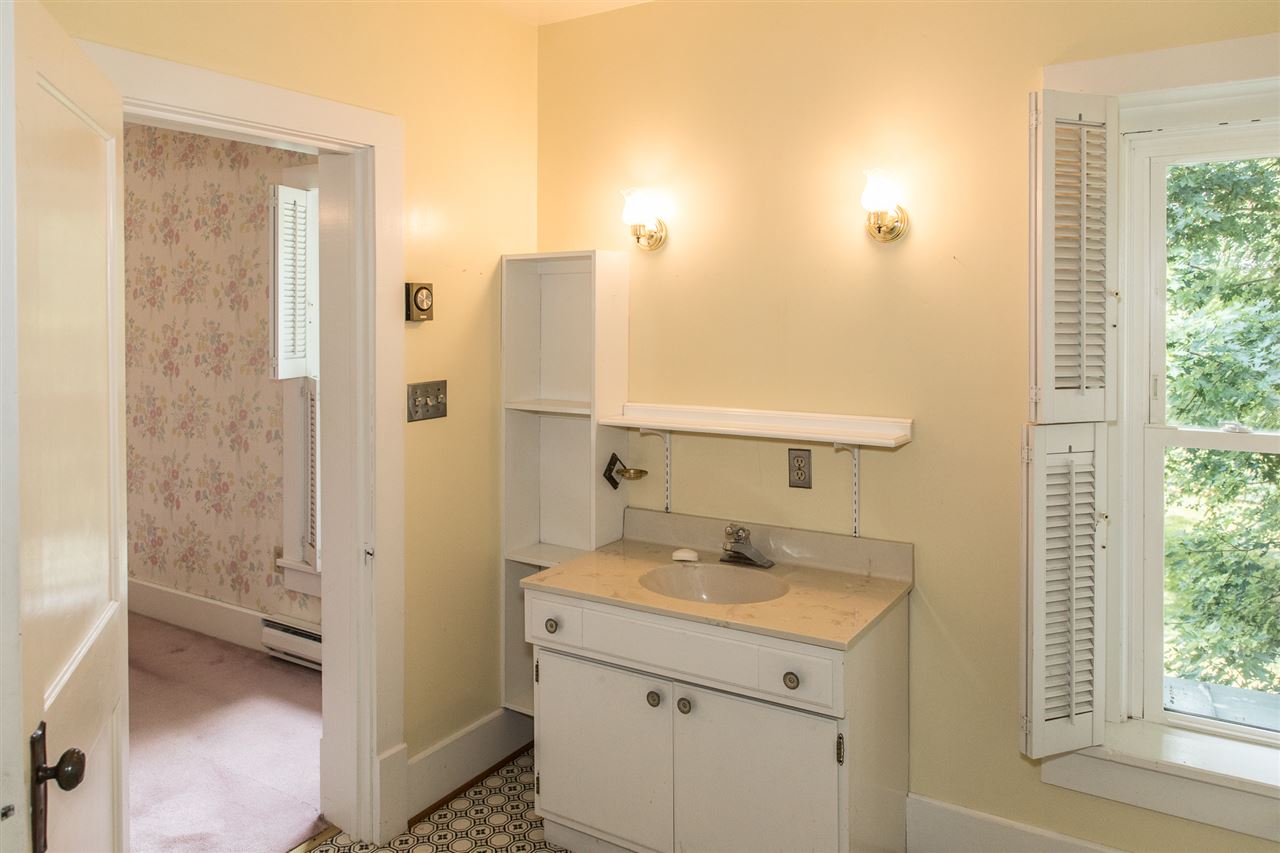 395 Kindig Road Waynesboro, VA 22980 - Photo 34 of 45 a bathroom with a sink a mirror and a shower