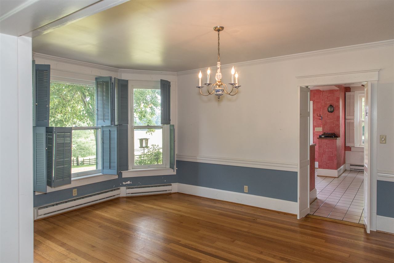 395 Kindig Road Waynesboro, VA 22980 - Photo 9 of 45 a view of empty room with wooden floor and fan