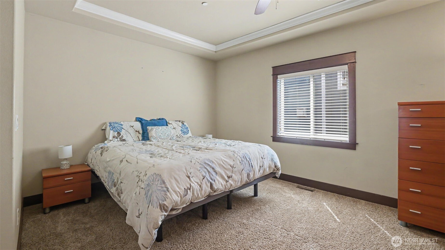 1357 Elma Place Northeast Renton, WA 98059 - Photo 15 of 40 a bed sitting in a bedroom next to a window