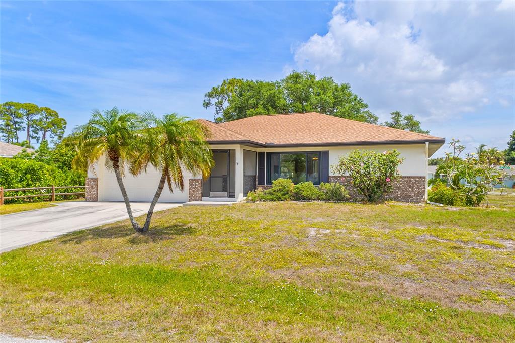 420 Duke Road Venice, FL 34293 - Photo 1 of 22 a house with swimming pool in front of it