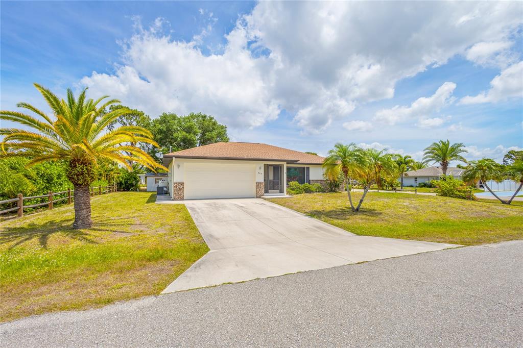 420 Duke Road Venice, FL 34293 - Photo 2 of 22 a house with swimming pool in front of it