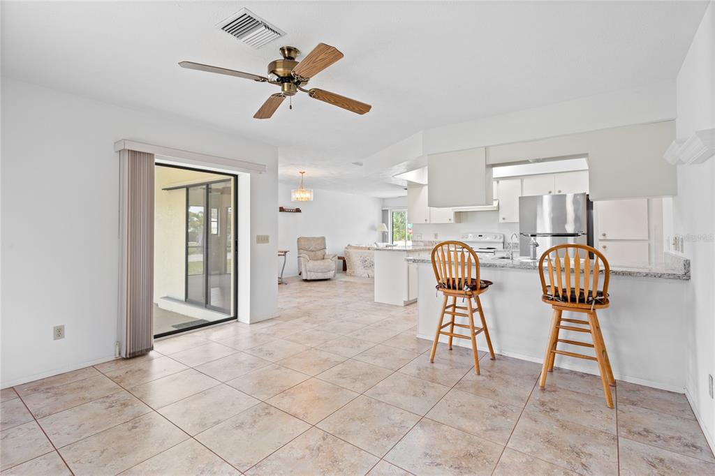 420 Duke Road Venice, FL 34293 - Photo 9 of 22 a living room with furniture and a window