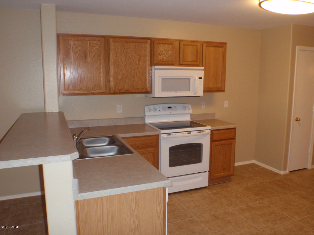 16168 West Calavar Road Surprise, AZ 85379 - Photo 11 of 20 Kitchen