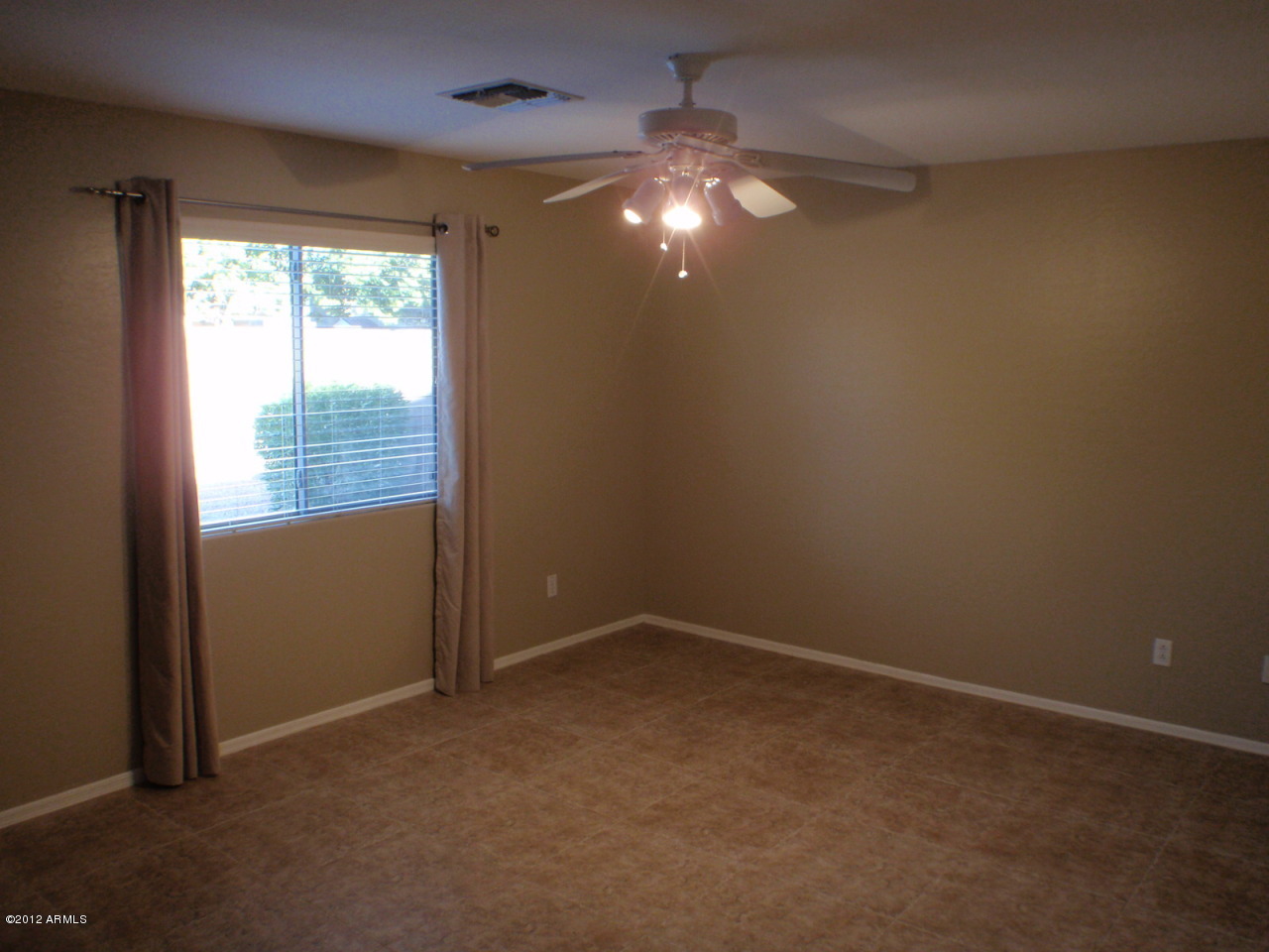16168 West Calavar Road Surprise, AZ 85379 - Photo 14 of 20 Master bedroom