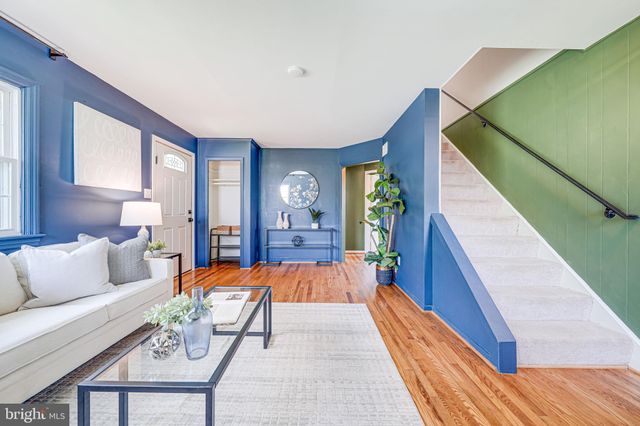 a balcony with lamp and outdoor view