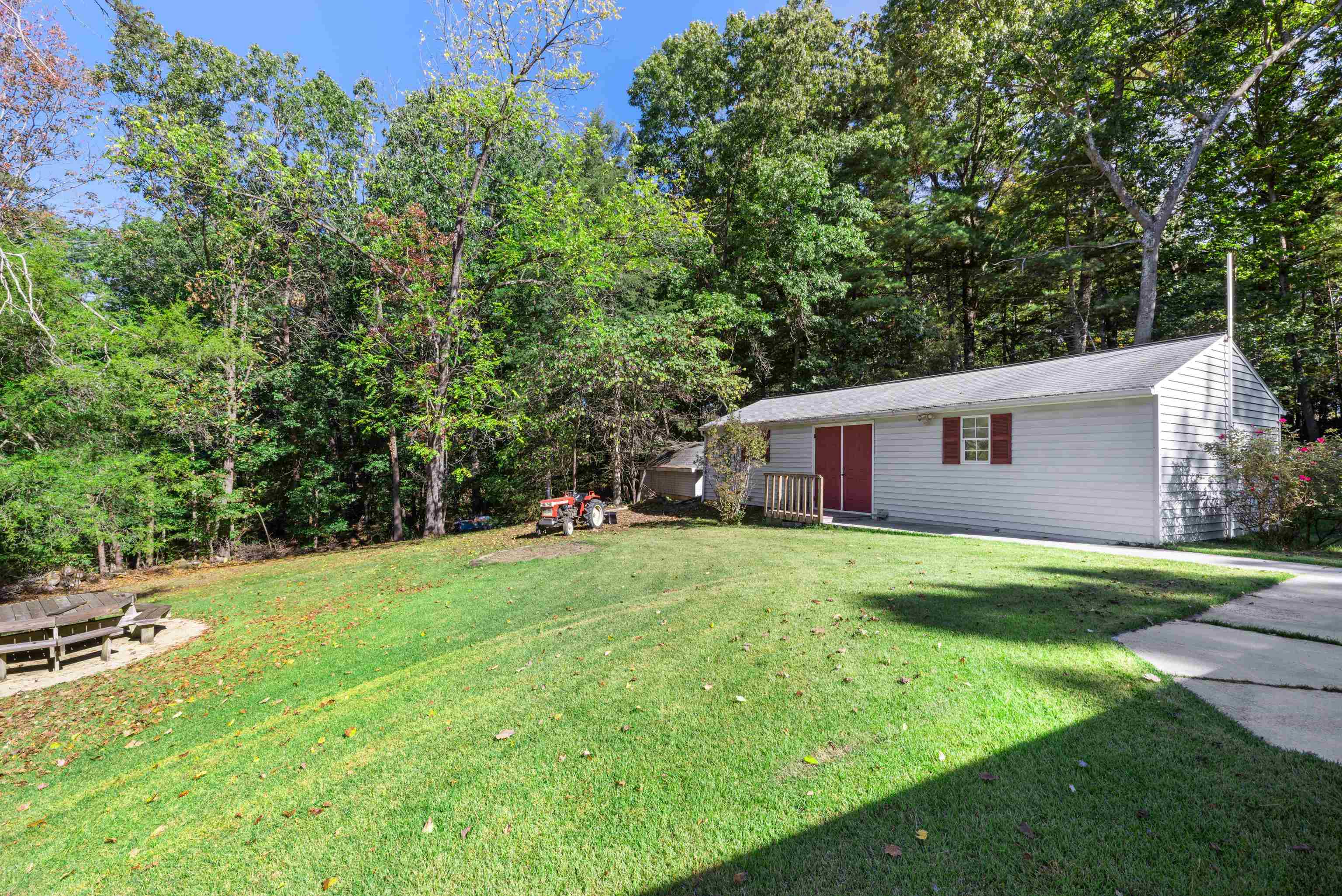 2106 Laurel Hill Road Staunton, VA 24401 - Photo 15 of 46 a front view of a house with a yard and trees