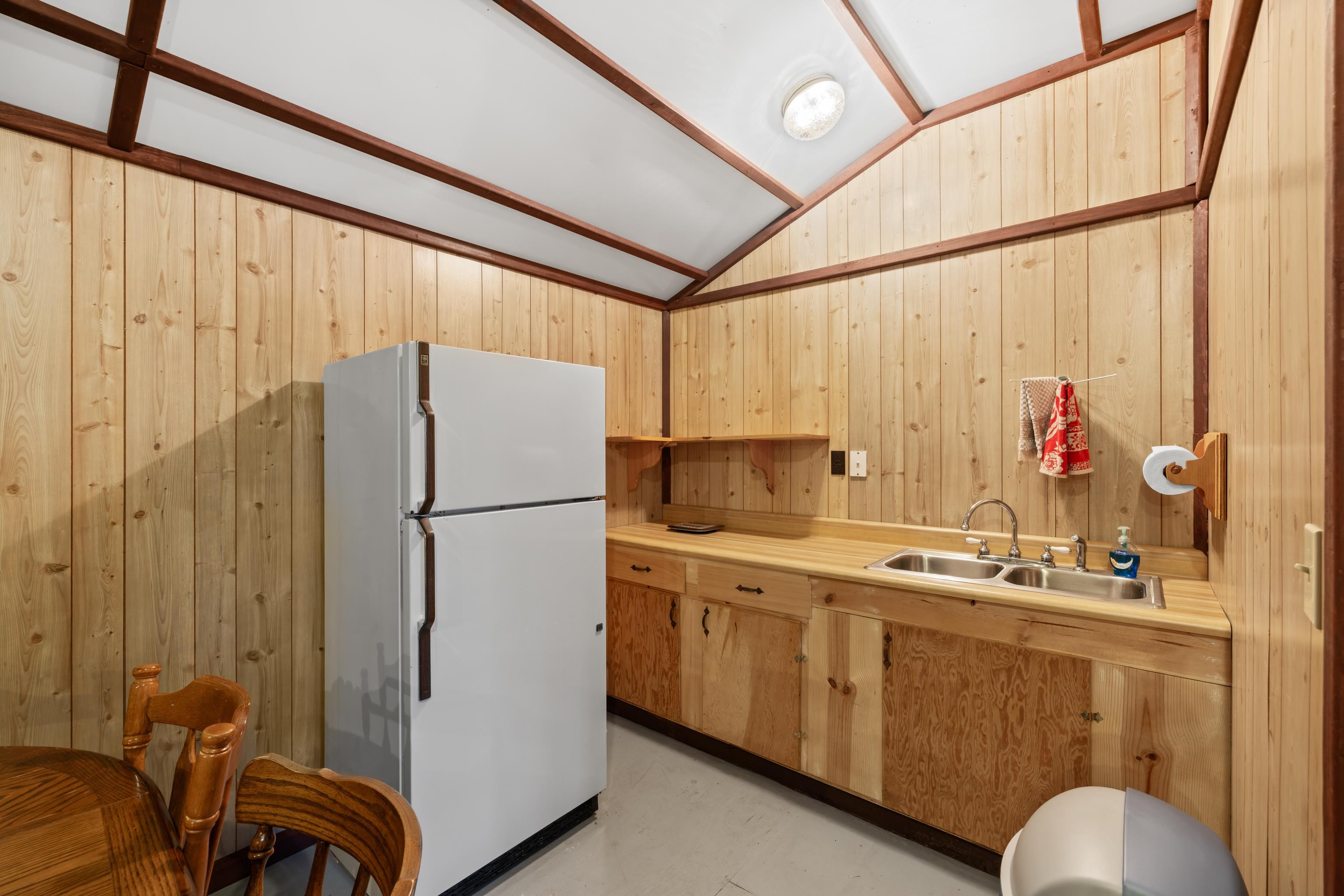 2106 Laurel Hill Road Staunton, VA 24401 - Photo 19 of 46 a white kitchen with a sink appliances and cabinets