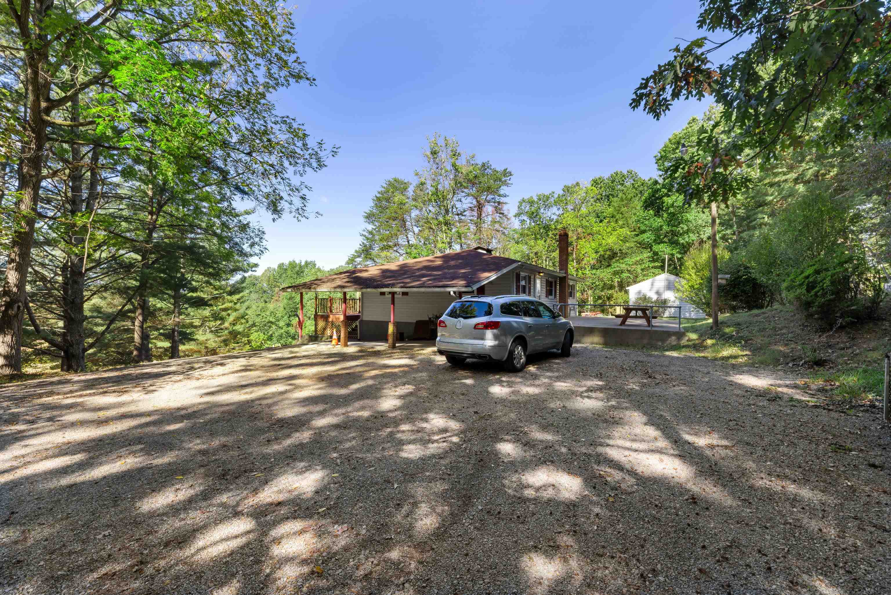 2106 Laurel Hill Road Staunton, VA 24401 - Photo 27 of 46 a house view with a car parked in front of it