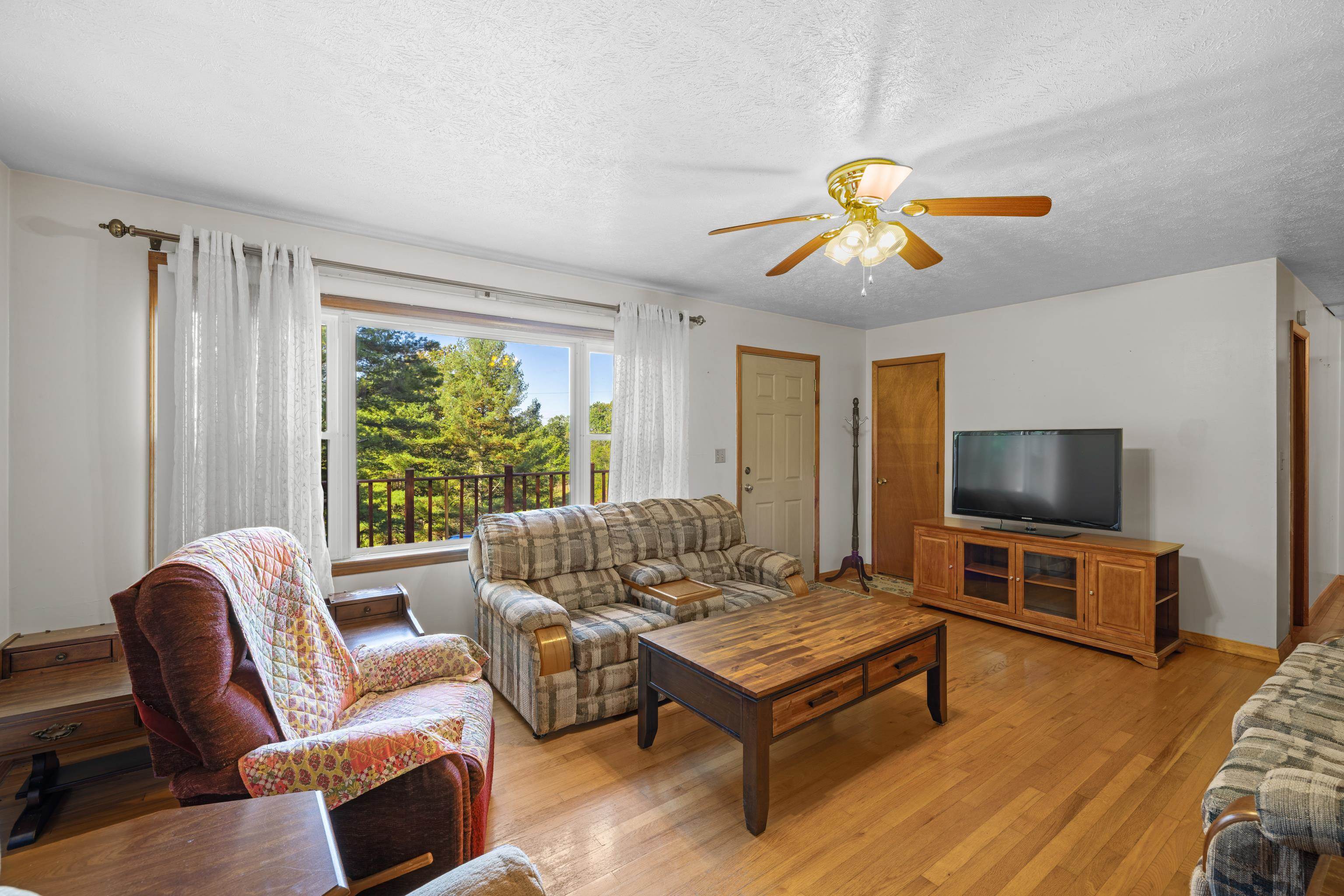 2106 Laurel Hill Road Staunton, VA 24401 - Photo 3 of 46 a living room with furniture and a flat screen tv