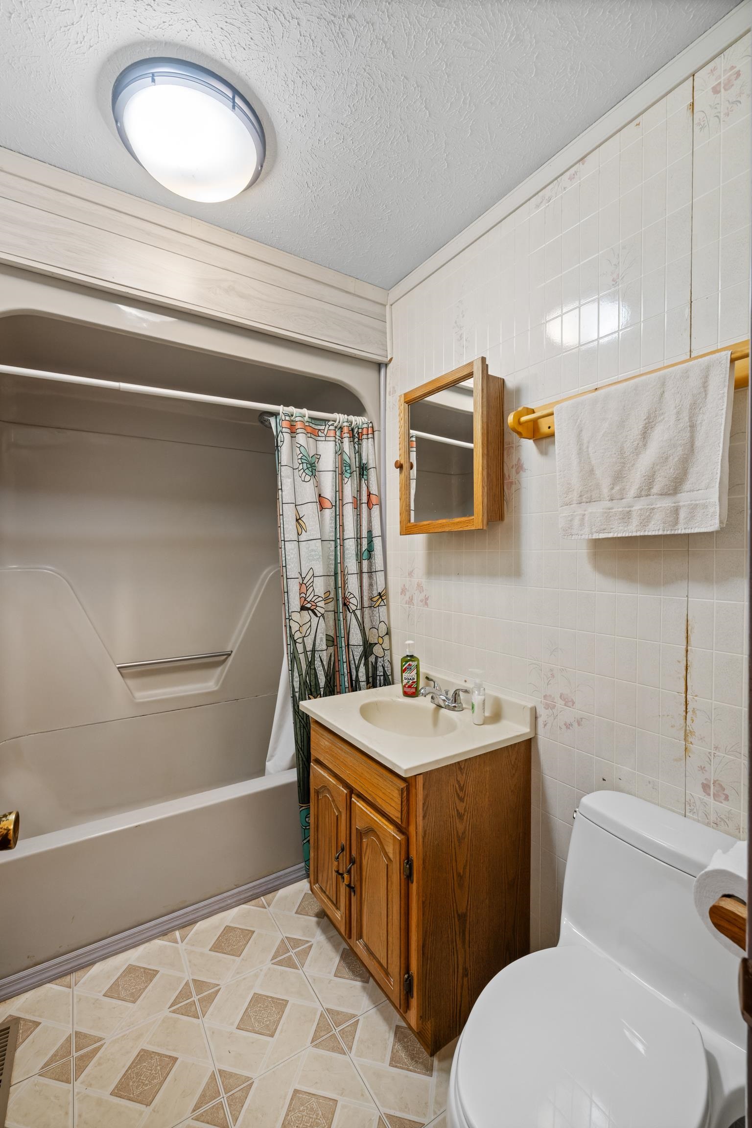 2106 Laurel Hill Road Staunton, VA 24401 - Photo 10 of 46 a bathroom with a sink a mirror and a toilet