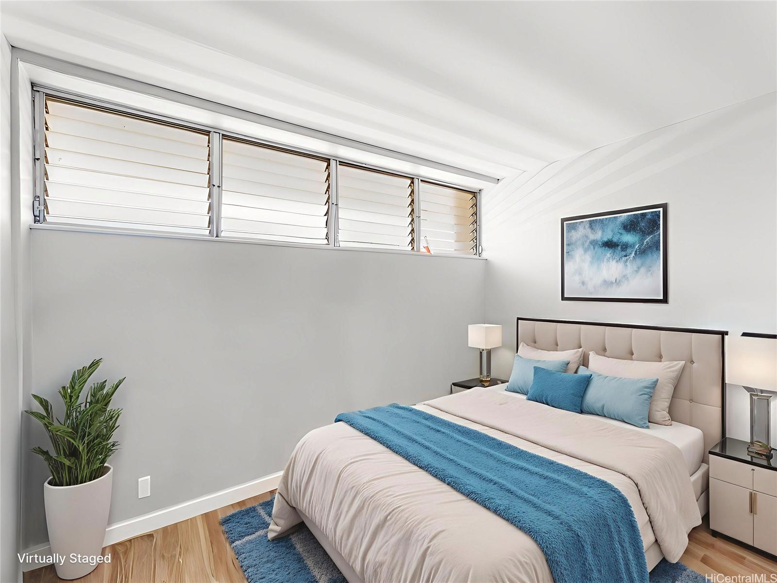 4300 Waialae Avenue, Unit B601 Honolulu, HI 96816 - Photo 16 of 18 a bedroom with a bed and a window
