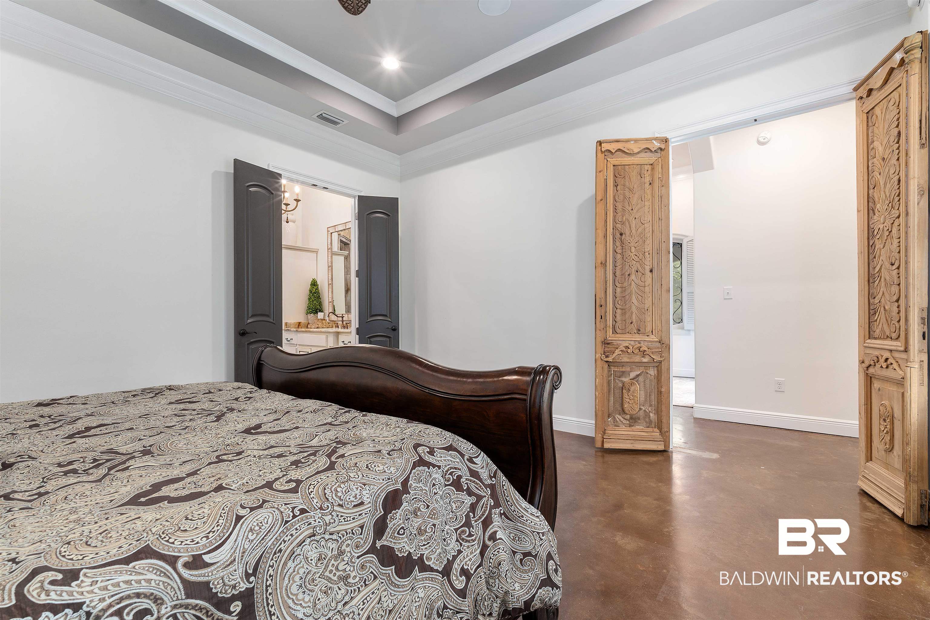 3584 Rue Royal Mobile, AL 36693 - Photo 17 of 35 Bedroom with visible vents, baseboards, finished concrete floors, ornamental molding, and recessed lighting