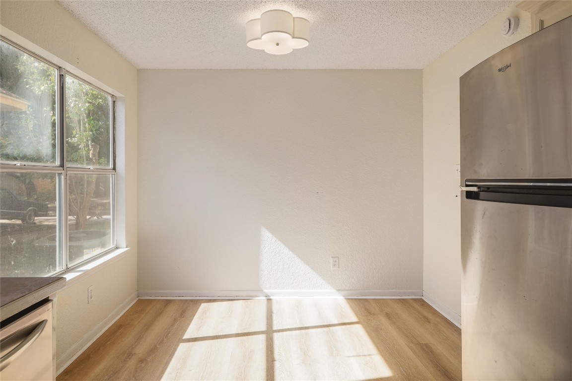 2229 Jasmine Path Round Rock, TX 78664 - Photo 10 of 28 a view of a hardwood floor in a room
