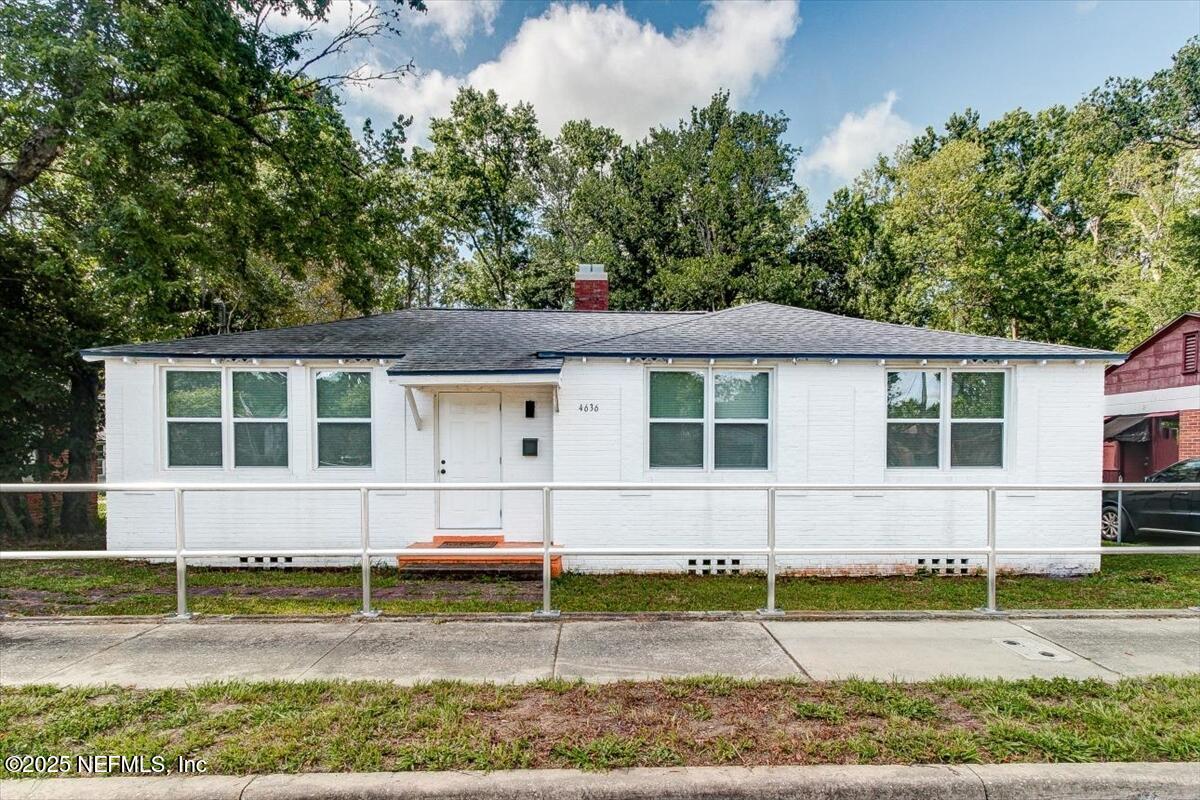 front view of house with a yard