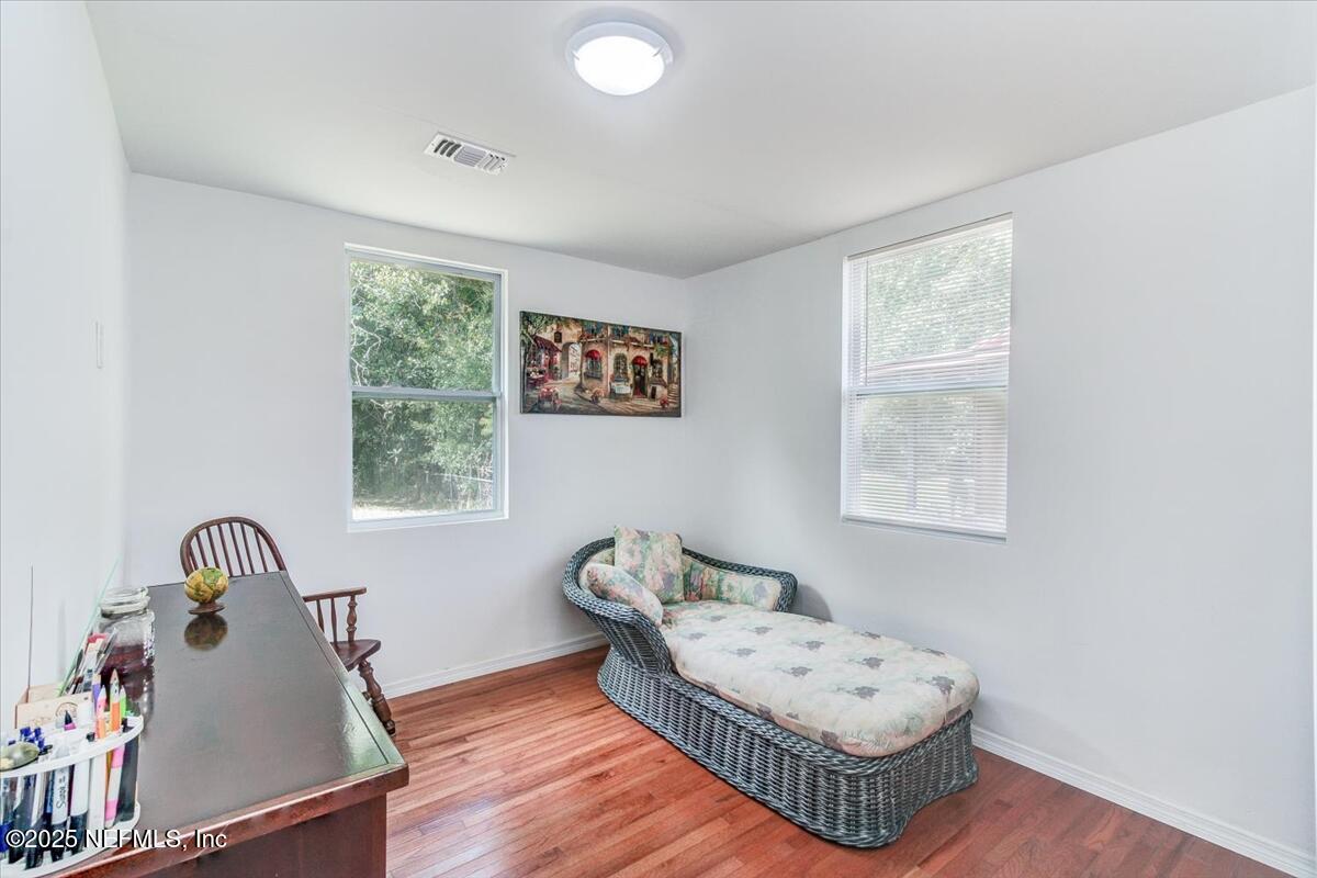 4636 Timuquana Road Jacksonville, FL 32210 - Photo 16 of 21 a living room with furniture and a window