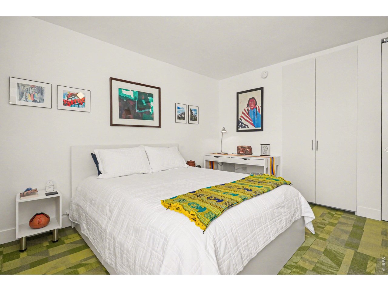 1020 15th Street, Unit 32L Denver, CO 80202 - Photo 21 of 32 a bedroom with a bed and a desk