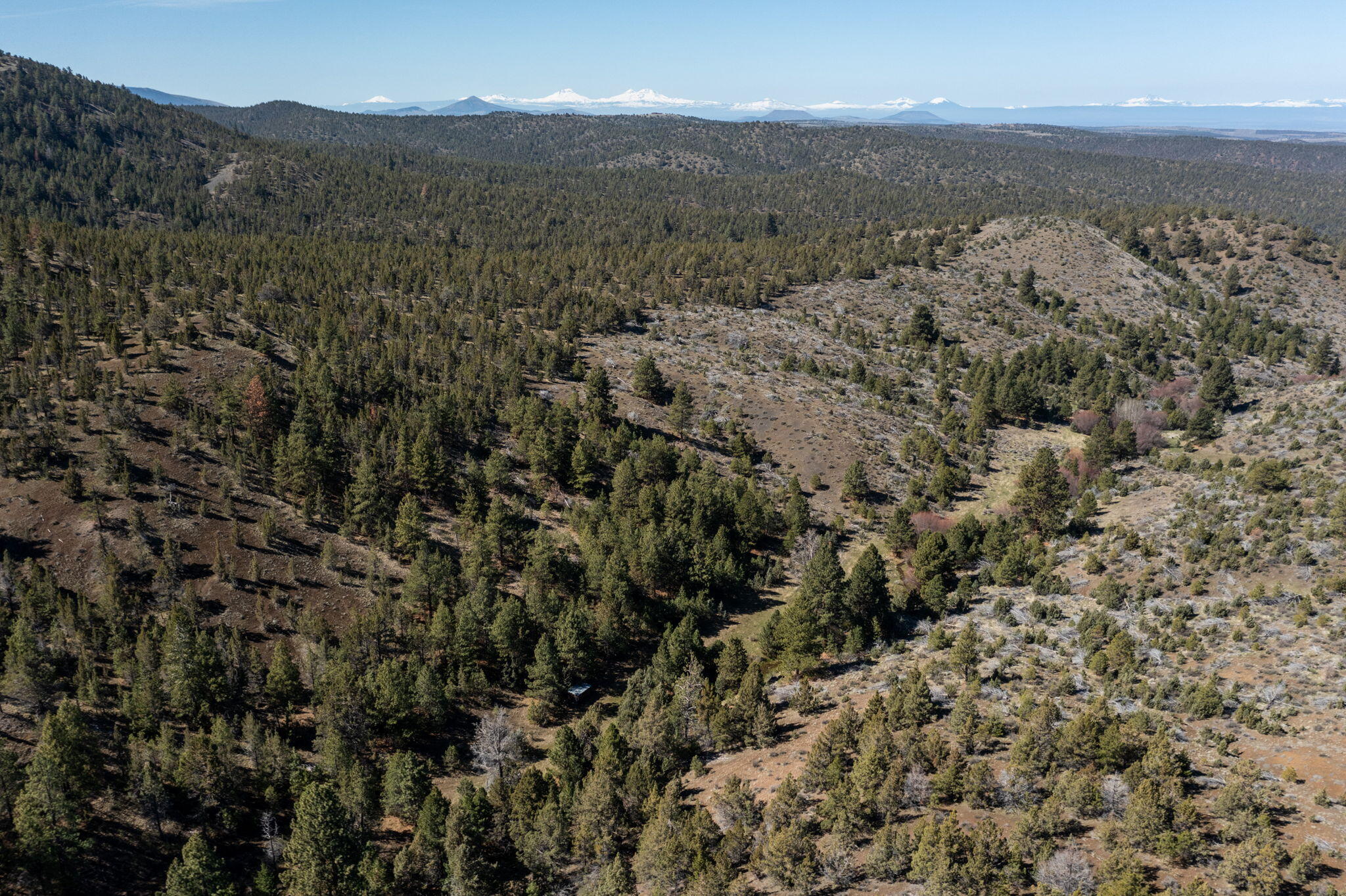 0 Southeast Grizzly Road, Unit 1215000000100 Madras, OR 97741 - Photo 17 of 39 a view of a city with mountains in the background