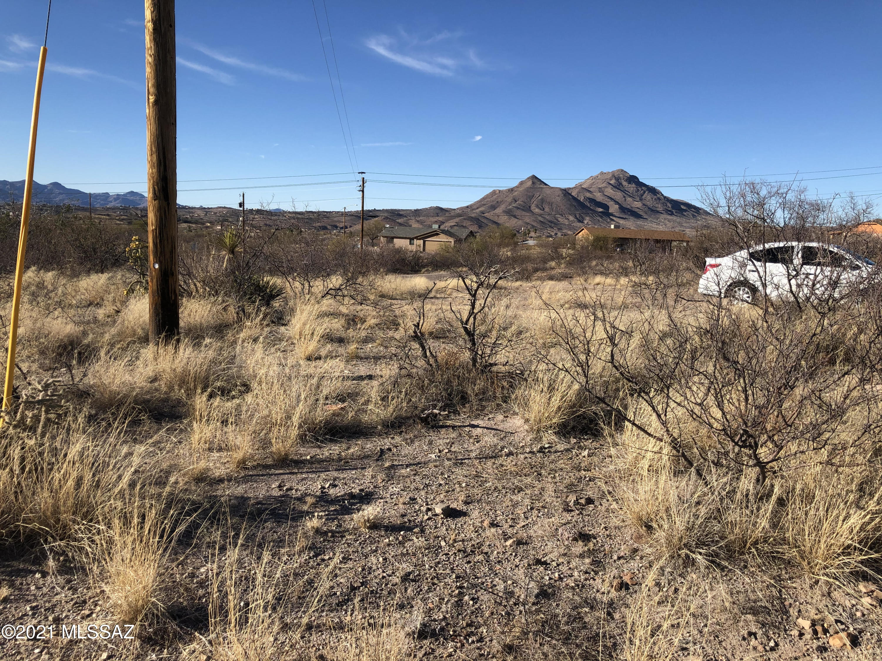 226 Cha Court, Unit 114 Rio Rico, AZ 85648 - Photo 2 of 3 a view of a dry yard with mountains