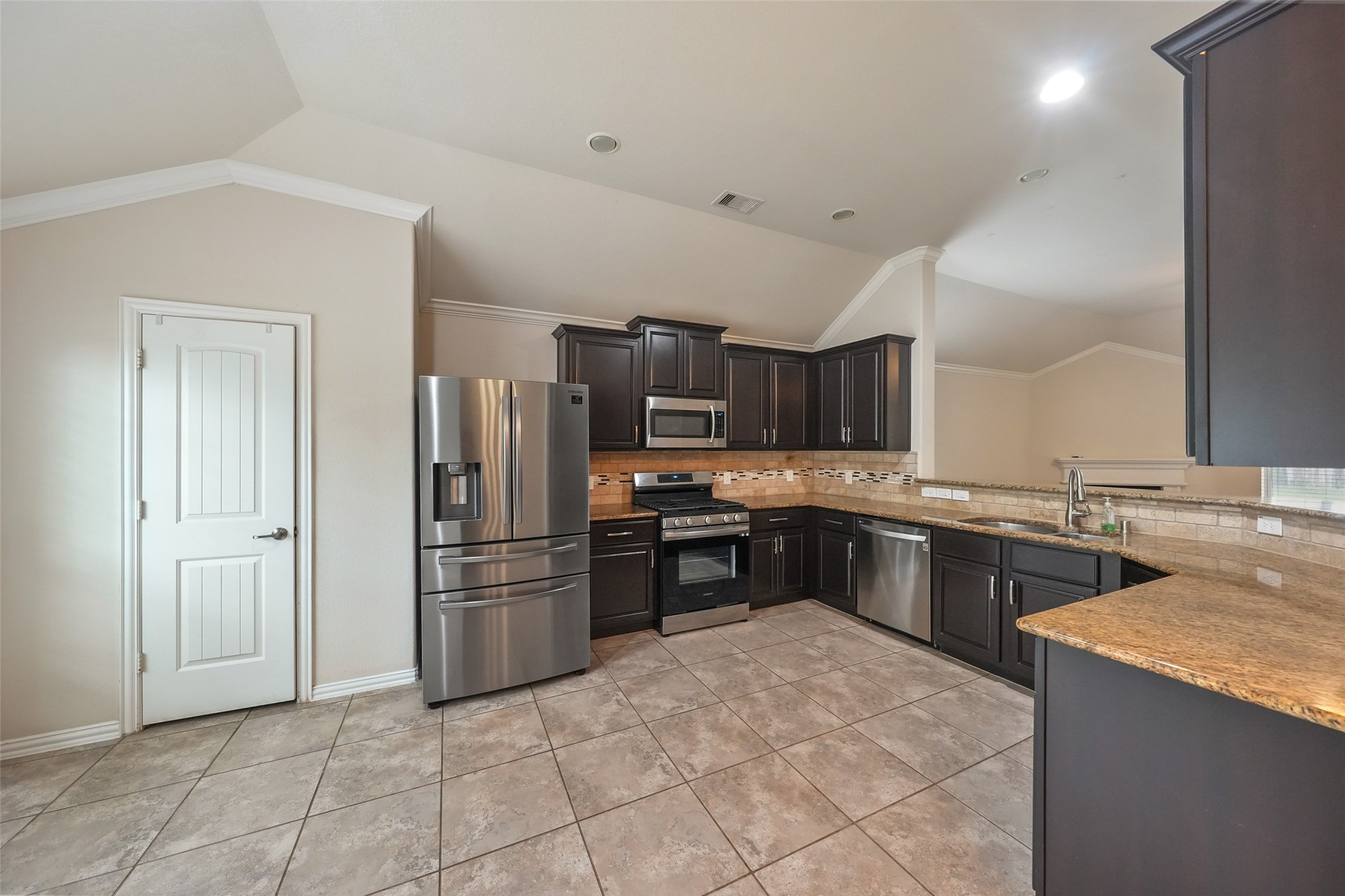 24138 McKinzie Ridge Drive Porter, TX 77365 - Photo 7 of 24 A cook's dream of beautiful cabinets - Samsung appliances - granite counter top