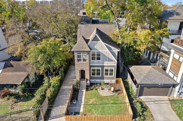 an aerial view of a house with entertaining space