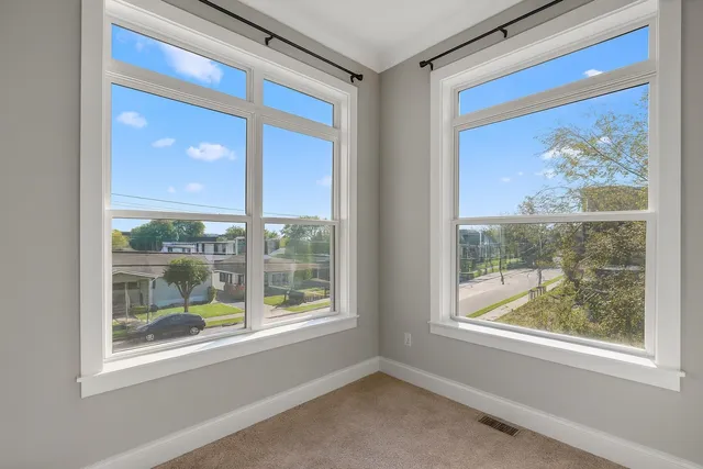 a view of a room that has a large window