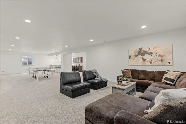 a living room with furniture and a couch